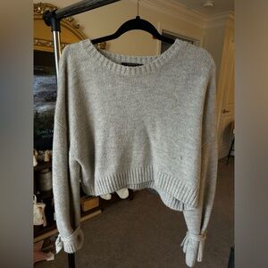 Grey sweater with ties on sleeves - size s 

Forever 21